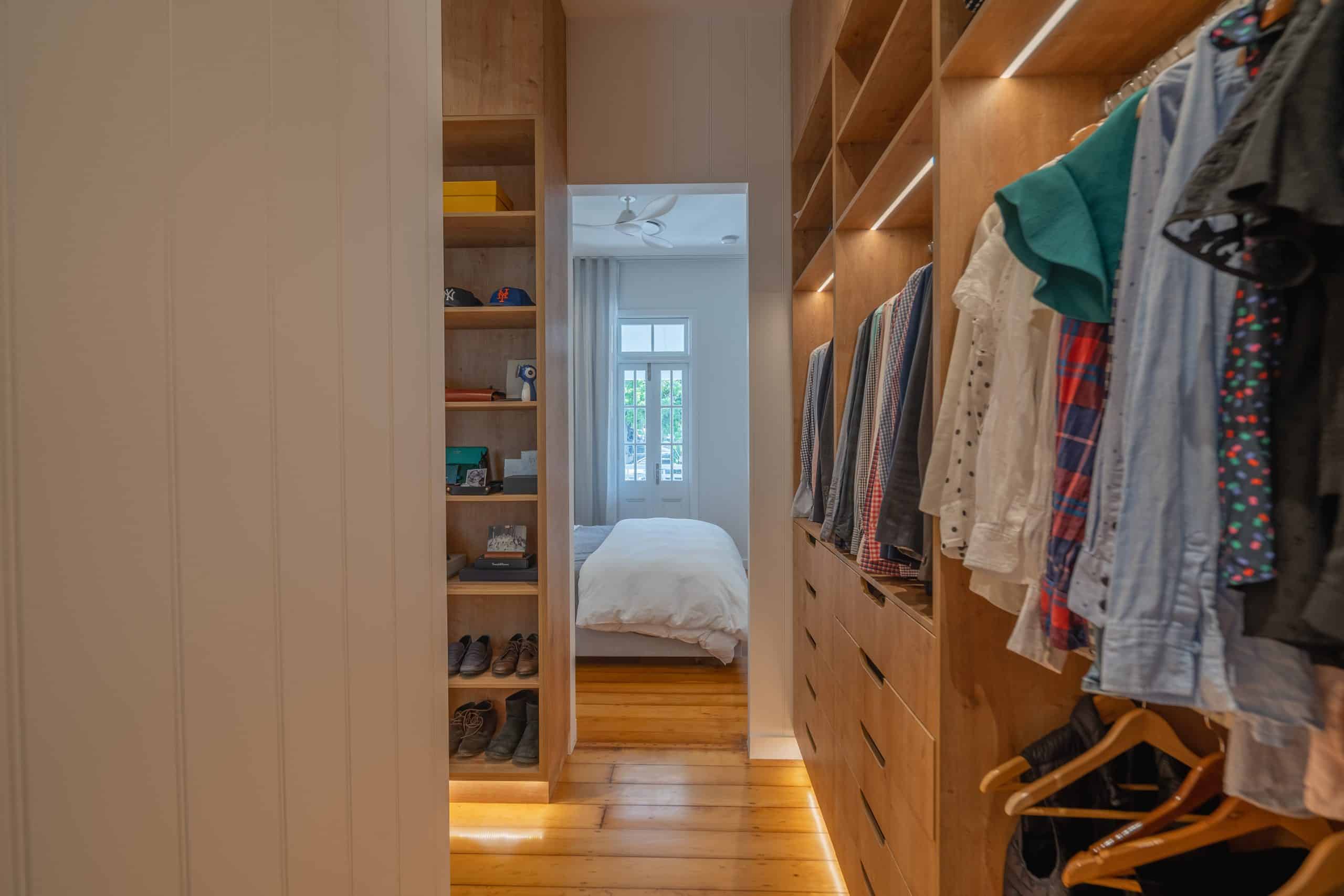 master bedroom walk-in wardrobe with custom timber